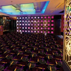 Elegant Dark-Based Carpet with Vivid Purple and Gold Accents for Entertainment Places